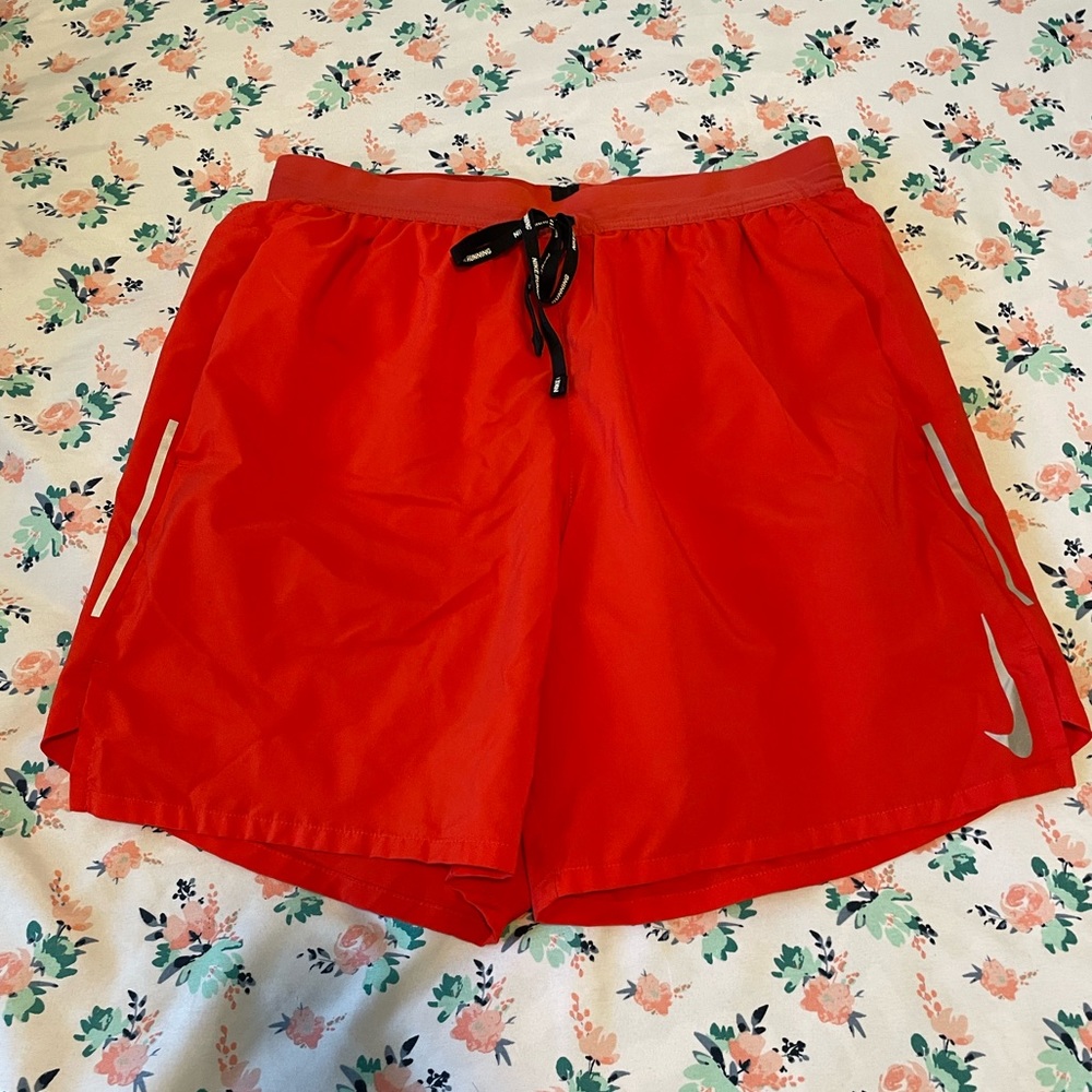 mens orange nike shorts size medium